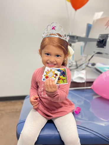 Caring for Dental Crowns Happy Jackson Patient with Prizes